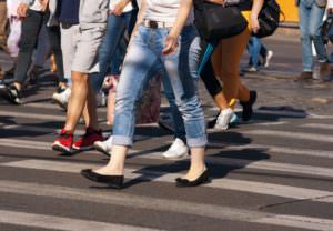 pedestrians walking on crosswalk