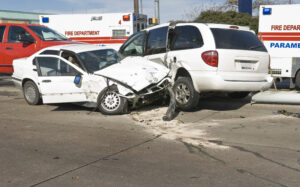 A photo of a car accident between a car and a minivan on the website of JustCallMoe.com.